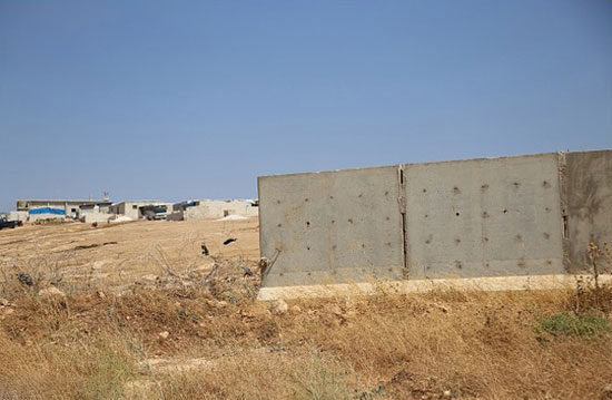 عکس: دیوارکشی ترکیه از ترس داعش