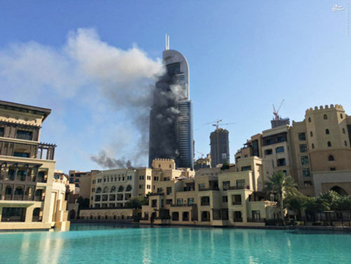 هتل 63 طبقه دبی همچنان در آتش +عکس