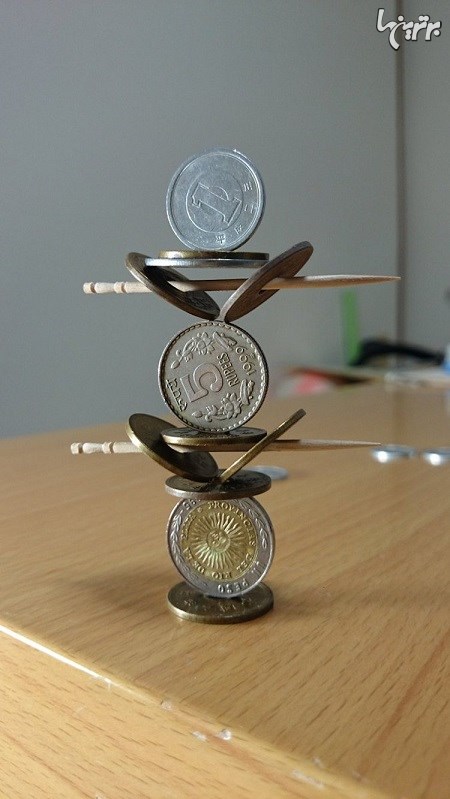 شاهکار هنرمند ژاپنی با روی هم چیدن سکه