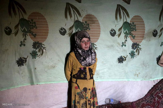 عکس: زندگی خانواده های سوری در غار!